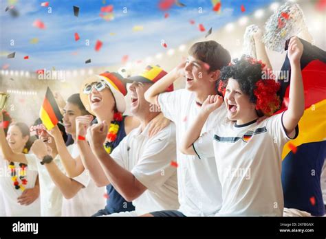 Germany Football Supporter On Stadium German Fans On Soccer Pitch