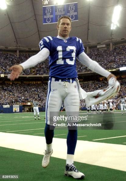 Indianapolis Colts kicker Mike Vanderjagt leads cheers from the field ...