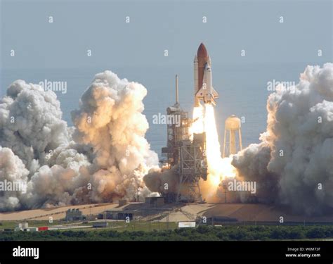 The Space Shuttle Discovery Lifts Off From Launch Complex 39b On