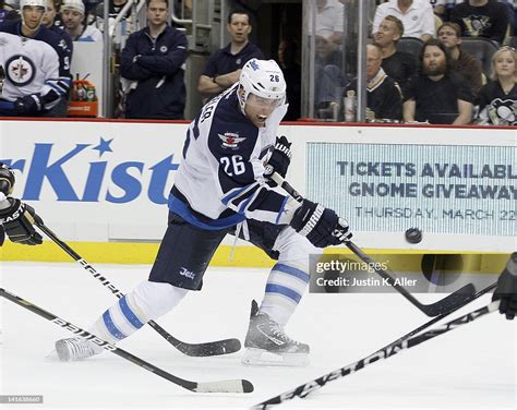 Blake Wheeler Of The Winnipeg Jets Handles The Puck Against The News