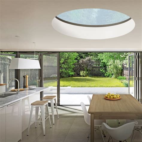 Round Skylight Design for Unique Rooflight Kitchen Extension