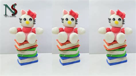 Clay Hello Kitty Sitting on books : r/crafts