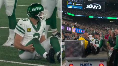 Aaron Rodgers Carted Off Field After Going Down With Leg Injury In