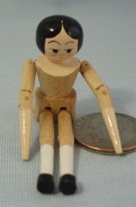 Tiny Miniature Penny Wooden Doll