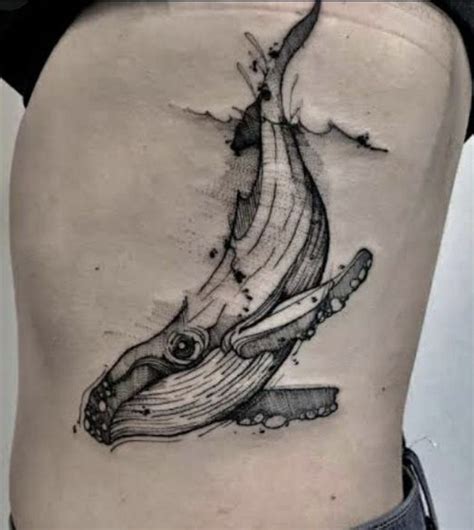 A Woman S Stomach With A Whale Tattoo On It