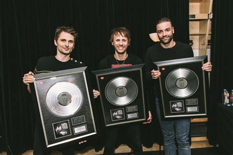 Muse receive Platinum plaques for Drones - Music Canada