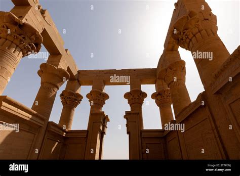 Hieroglyphic Covered Columns Reaching Into The Blue Sky Of At The