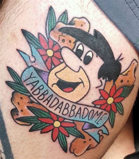 20 Amazing Fred Flintstone Tattoo Designs With Meanings And Ideas