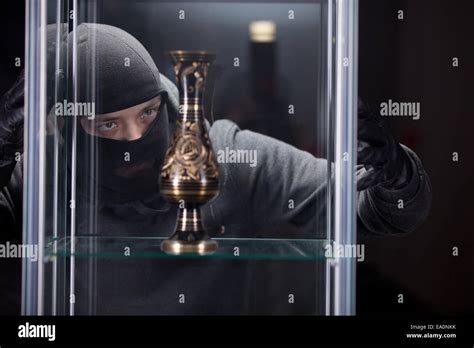 burglar wearing black mask Stock Photo - Alamy