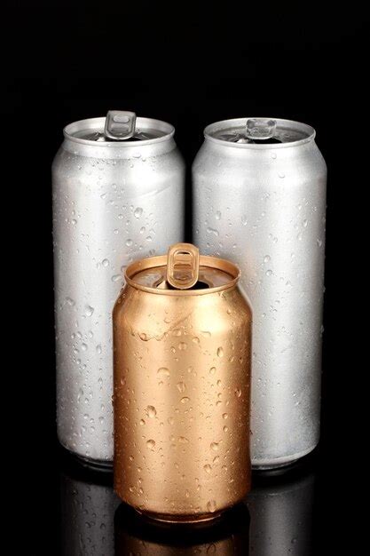 Premium Photo Aluminum Can With Water Drops Isolated On Black