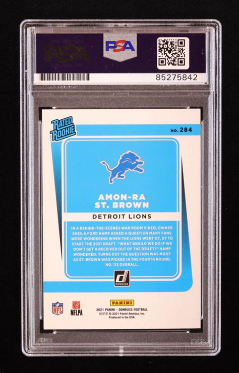 Amon Ra St Brown Signed 2021 Donruss 284 RR RC PSA Pristine Auction