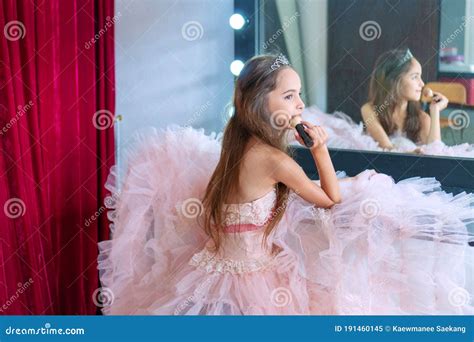 Girl Wear Pink Dress Sitting On A Chair In The Dressing Room And Make Yourself A Makeover She