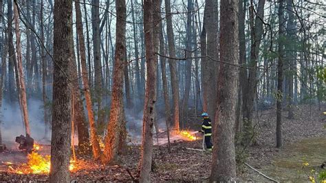 Crews battle scores of wildfires in Virginia, including a blaze in ...