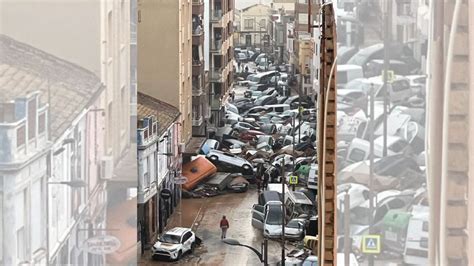 Fact Check Real Photo Of Cars Piled Up After Floods In Spain