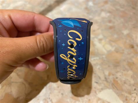 Photos New Class Of Mickey Graduation Magicband Arrives At Walt