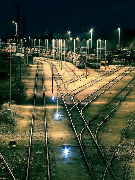 Premium Photo High Angle View Of Railway Tracks At Night