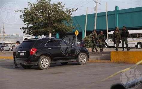 Balean A Hombre En Estacionamiento De Centro Comercial