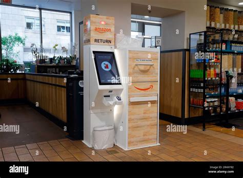 An Automated Amazon Return Kiosk At A Whole Foods Market For Dropping