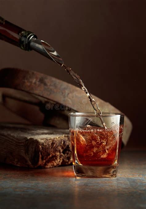 Whiskey Is Poured From A Carafe Into A Glass Stock Image Image Of Booze Beverage 142117213