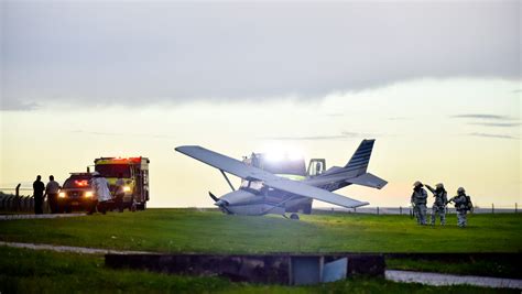 Plane crash lands at Guam airport, 3 safe