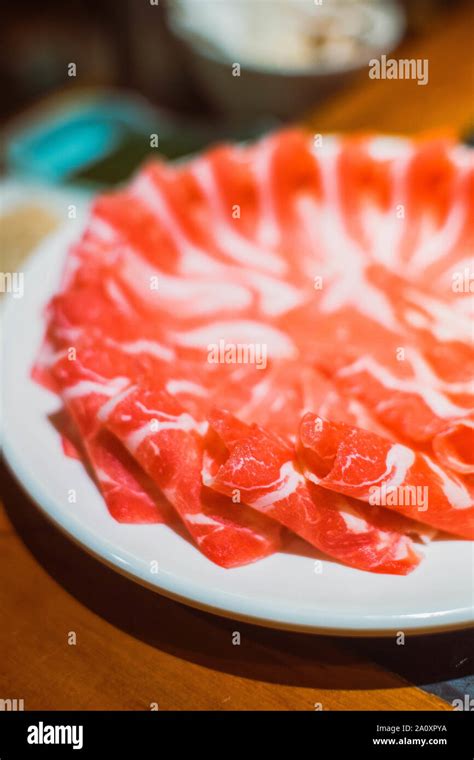 Beef Slices For Chinese Hot Pot With Boiling Mala Spicy Soup Stock Photo Alamy