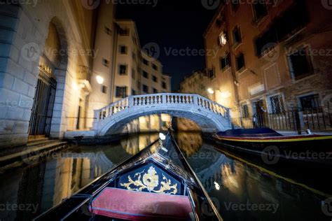 Venice Gondola tour at night 20298784 Stock Photo at Vecteezy