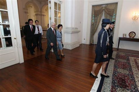 President Tony Tan And His Wife Mrs Mary Tan Walking Out Of