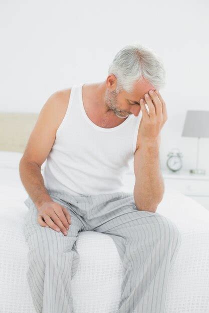 Premium Photo Mature Man Suffering From Headache In Bed