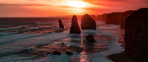 2560x1080 The Twelve Apostles Coastline Rock Sunset 5k 2560x1080 Resolution HD 4k Wallpapers ...