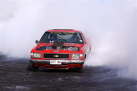 V8 Ute Doing A Burnout Photograph by Stephen Athea