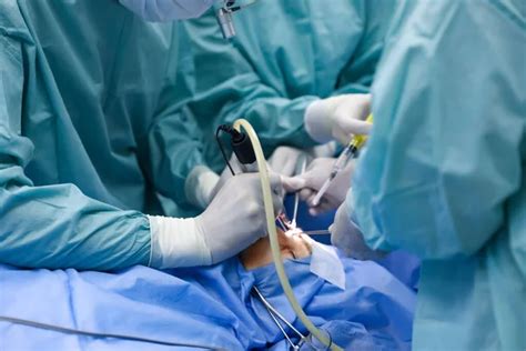 Team Professional Doctors Performing Operation Surgery Room Stock Photo