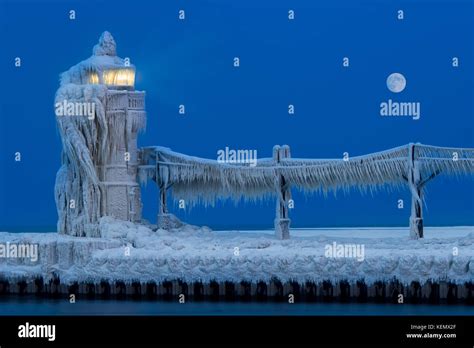 Ice Accumulates On The St Joseph North Pier Lighthouse In Saint Joseph