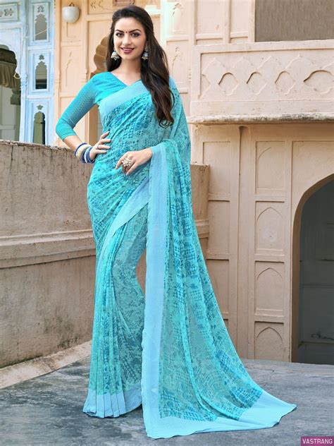 Uniqe Print Sky Blue Color Georgette Printed Party Wear Saree Party Wear Sarees Saree Styles