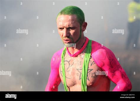 Competitor Tackles The Fire Hazard Part Of Tough Guy Competition Hi Res