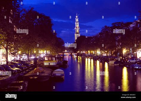 Amsterdam canal at night Stock Photo - Alamy