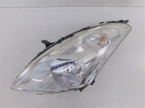 SUZUKI SWIFT MK7 LAMPA PRZÓD LEWA 12100758945 oficjalne archiwum