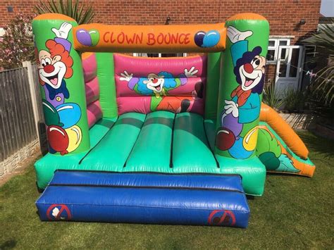 Clown Themed Bouncy Castle With Slide In Loughborough Leicestershire