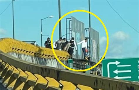 VIDEO Policías evitan que un hombre se arroje del puente de Periférico