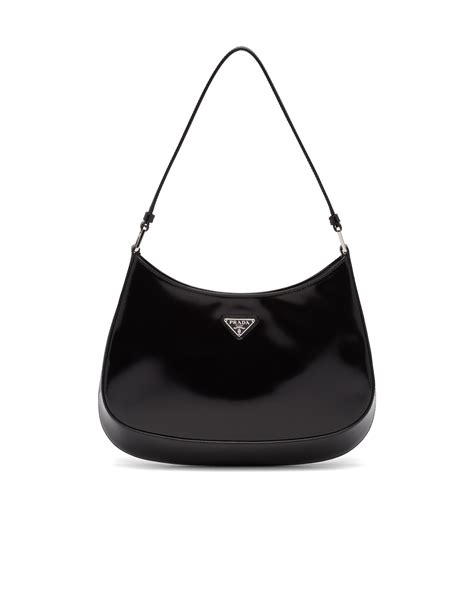 The Prada Cleo Bag With Sophisticated Allure Reinterprets An Iconic