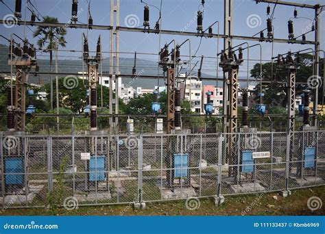 A Transformer Yard Close View With Background City Building Editorial