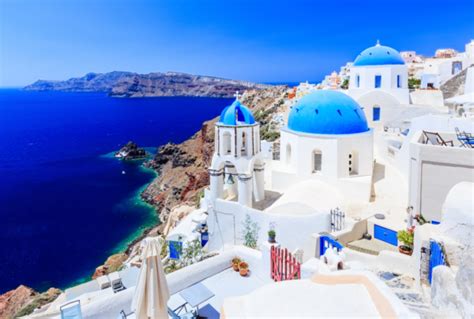 Why are Santorini houses white and blue? - Charisma Suites - Luxury ...