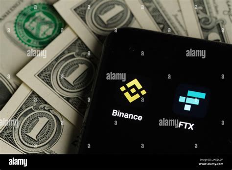 Binance And FTX Cryptocurrency Exchange Apps Seen On Smartphone