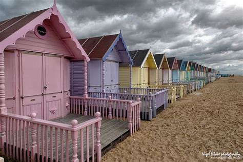 Pastel Coloured Beach Huts At West Mersea Essex England Beach Hut