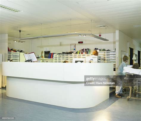 Hospital Reception Desk High-Res Stock Photo - Getty Images