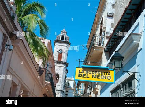 Exterior Of La Bodeguita Del Medio With Cathedral Havana Cuba Stock