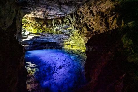 The Blue Water Of Poco Encantado Or Enchanted Well In A Cave At Itaete