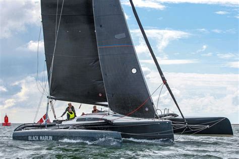 Black Marlin Fast Trimaran For Touring And Silverrudder Yacht