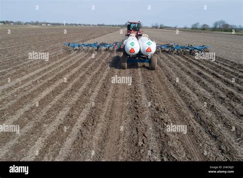 Aerial View Of Tractor Applying Anhydrous Ammonia To Corn Field Marion