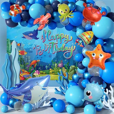 An Ocean Themed Birthday Party With Balloons And Decorations