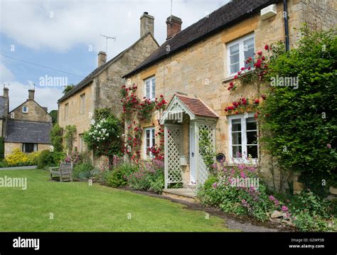 Cotswold Stone Cottages With Red Roses Stanton Cotswolds